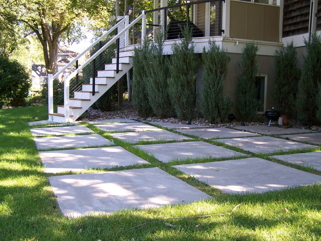 Raised deck with staircase to complement home.