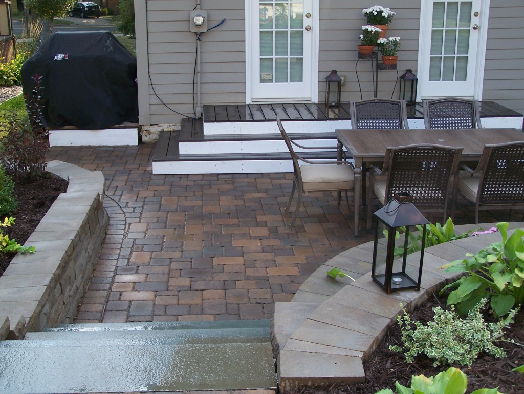 Simple deck designed to match stone patio.